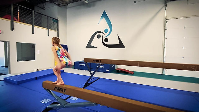 Tri gymnasts working on new skills